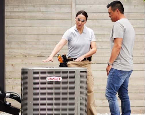 AC Installation Services being explained to a customer by a technician